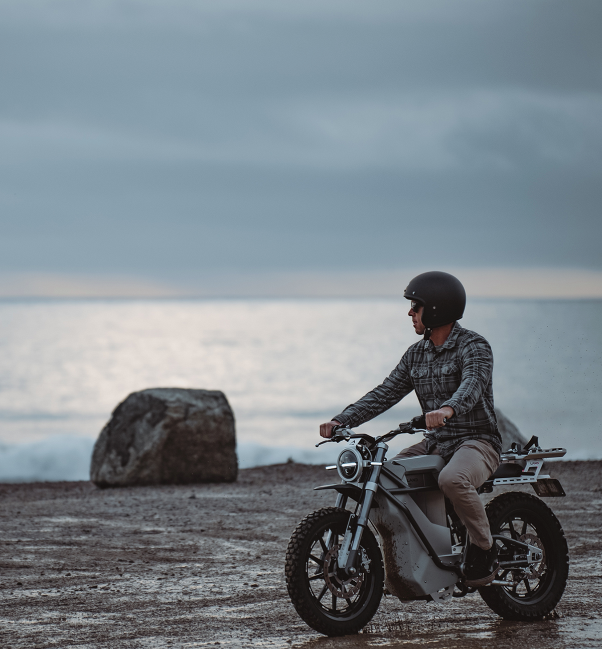 LAND District electric motorcycle in motion